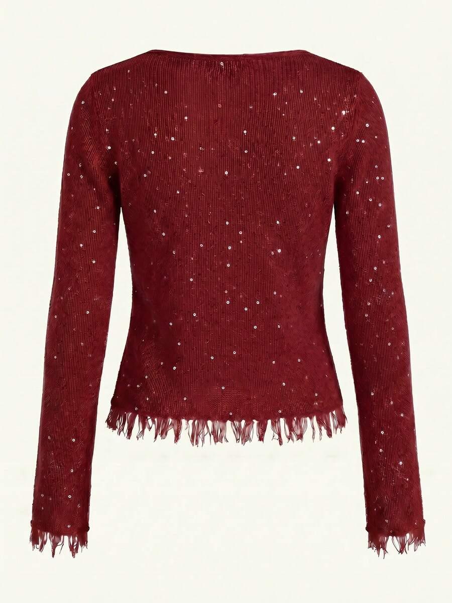czerwony sweter zdobienia