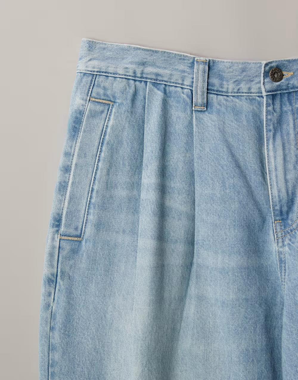 niebieskie spodnie jeans kieszenie