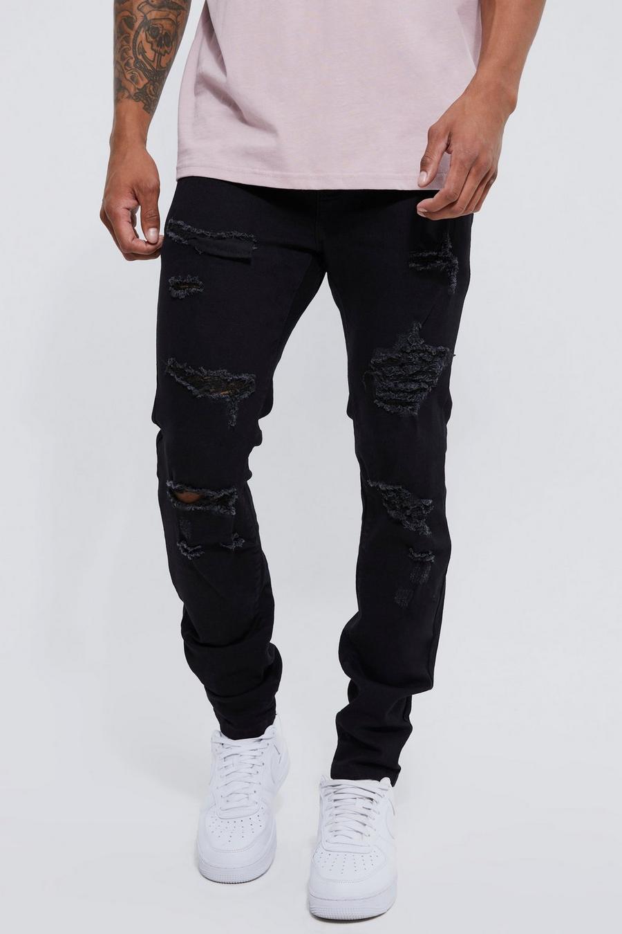 czarne spodnie jeans dziury przetarcia