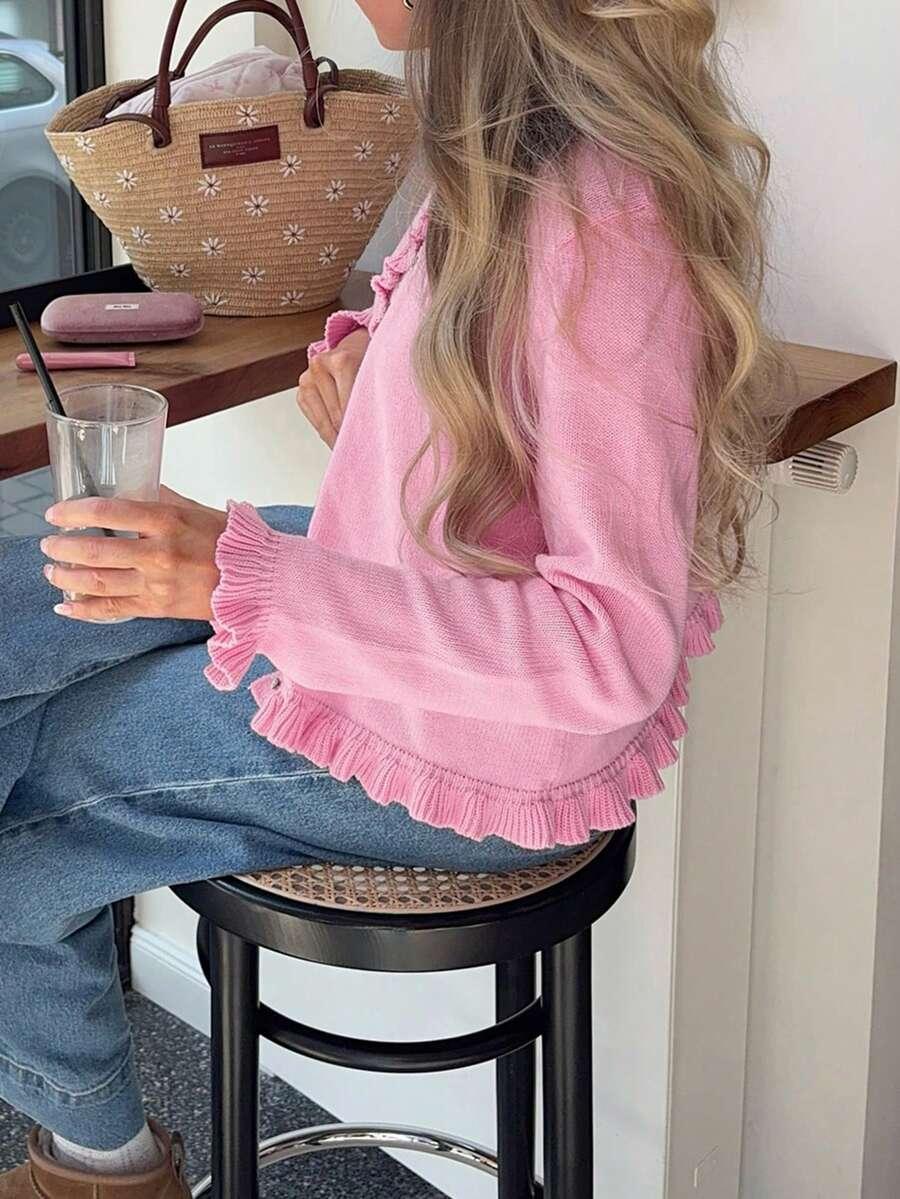 RÓŻOWY SWETER GUZIKI