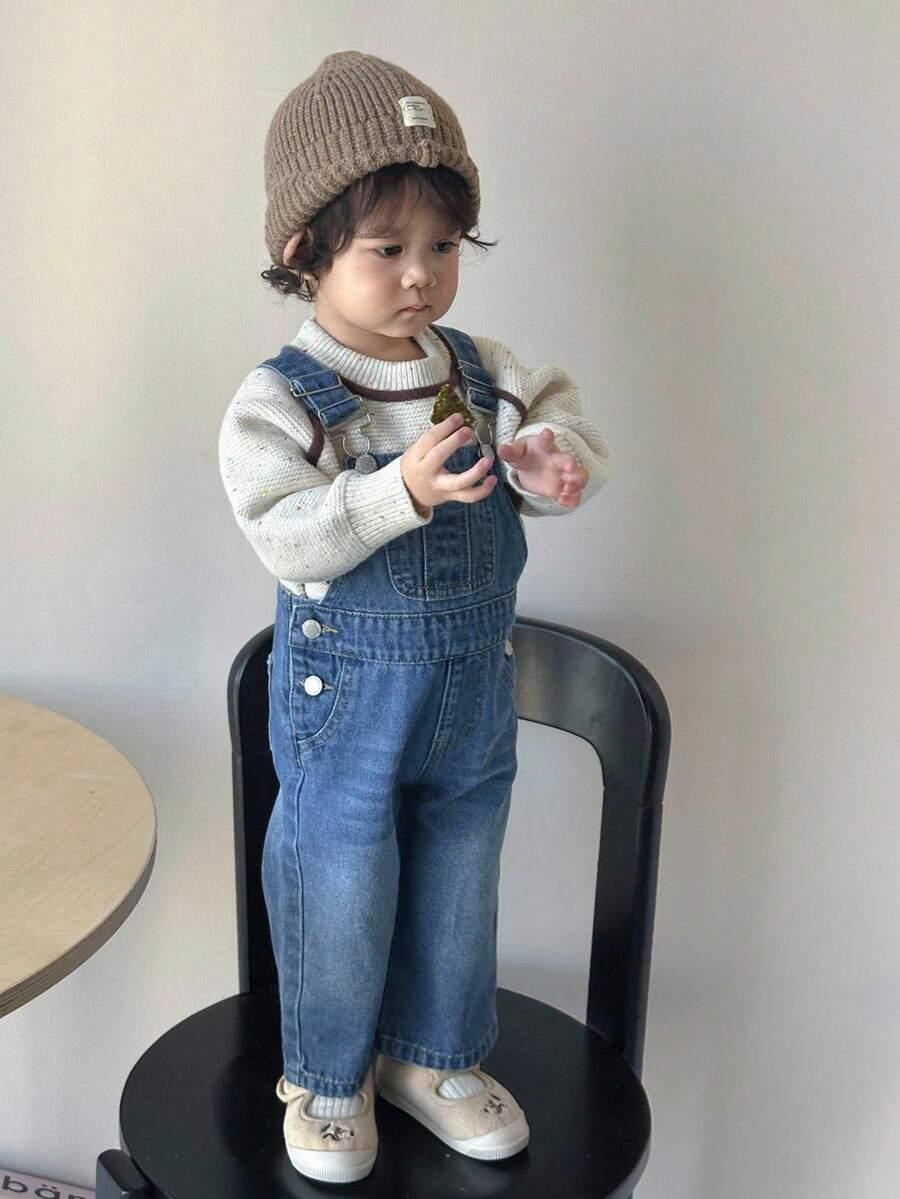 niebieskie ogrodniczki jeans