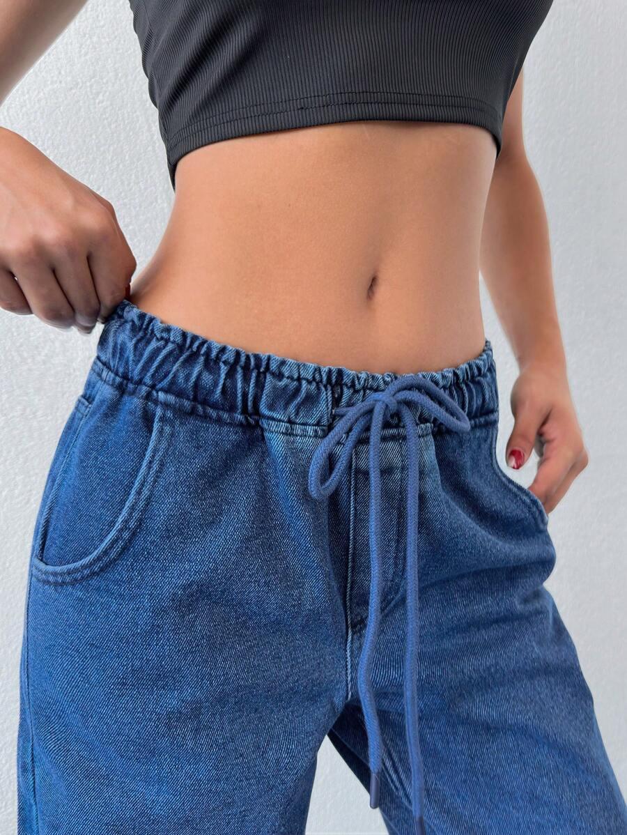 NIEBIESKIE SPODNIE JEANS wiązanie