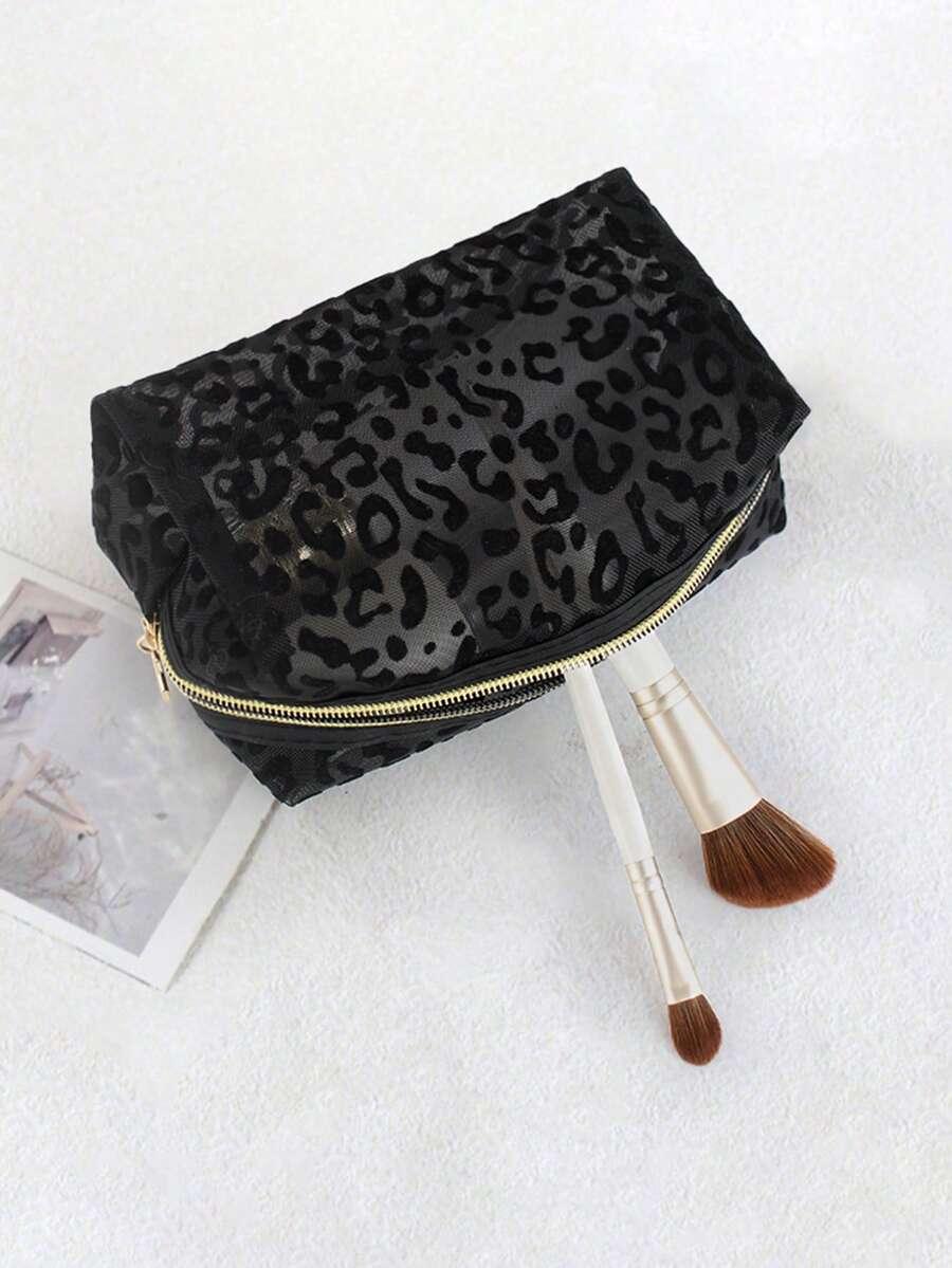czarna kosmetyczka animal print