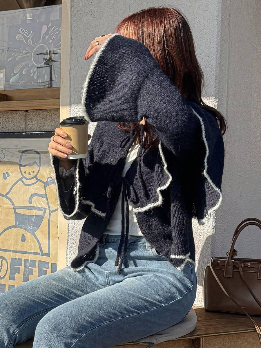 granatowy sweter wiązanie