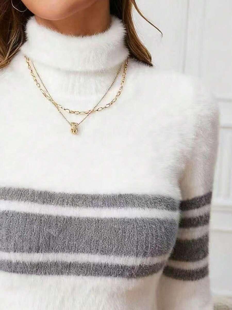 SWETER W PASKI