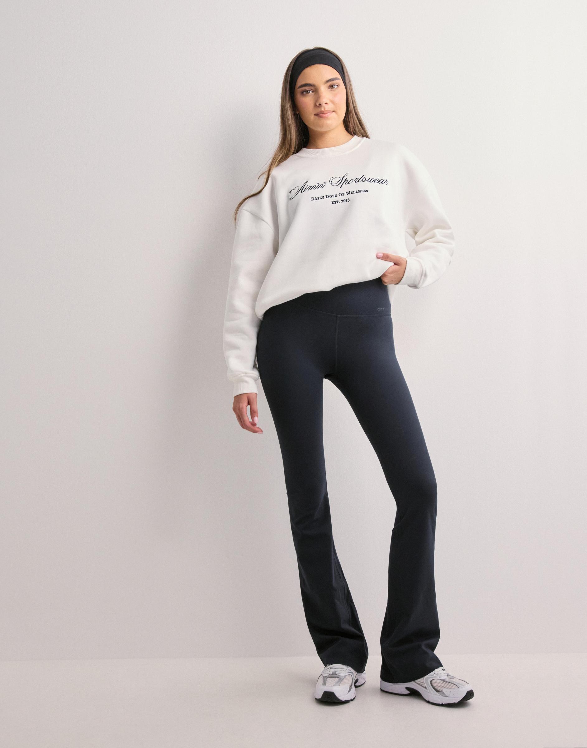 granatowe sportowe legginsy z wysokim stanem flare