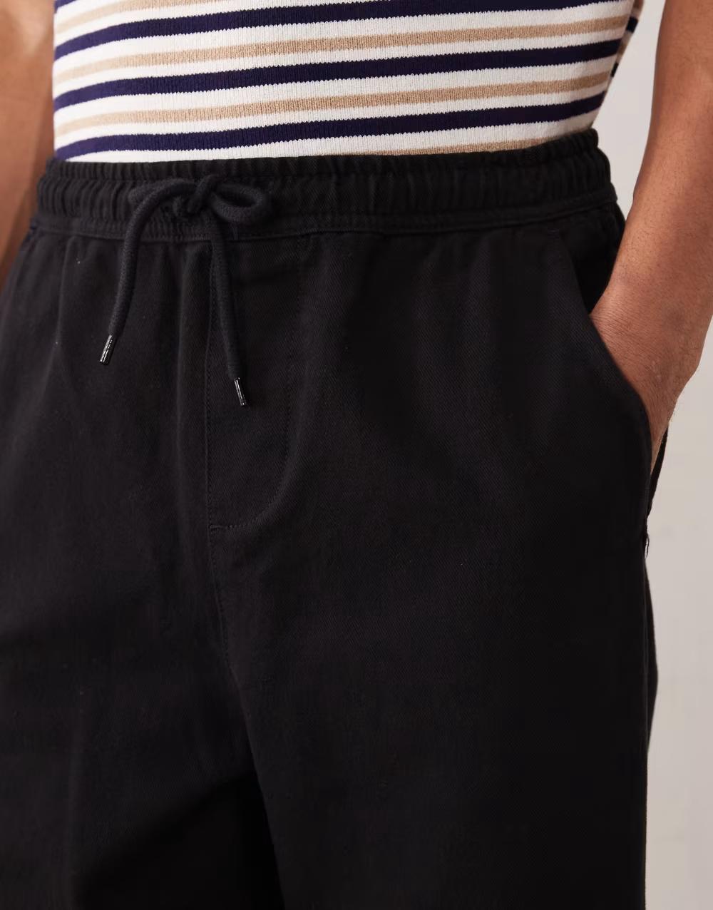 czarne proste spodnie jeans wiązanie kieszenie