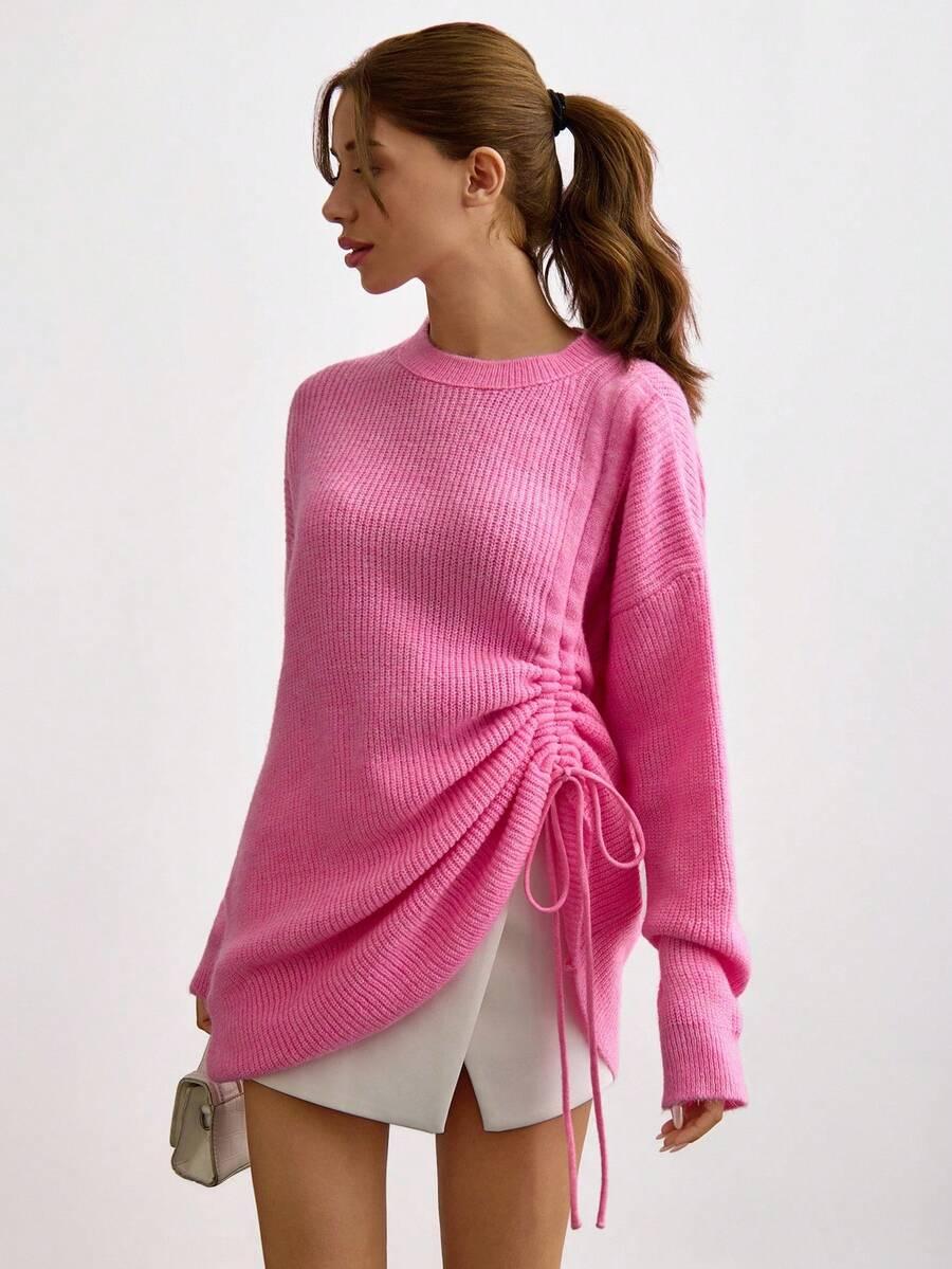 różowy sweter ściągacz