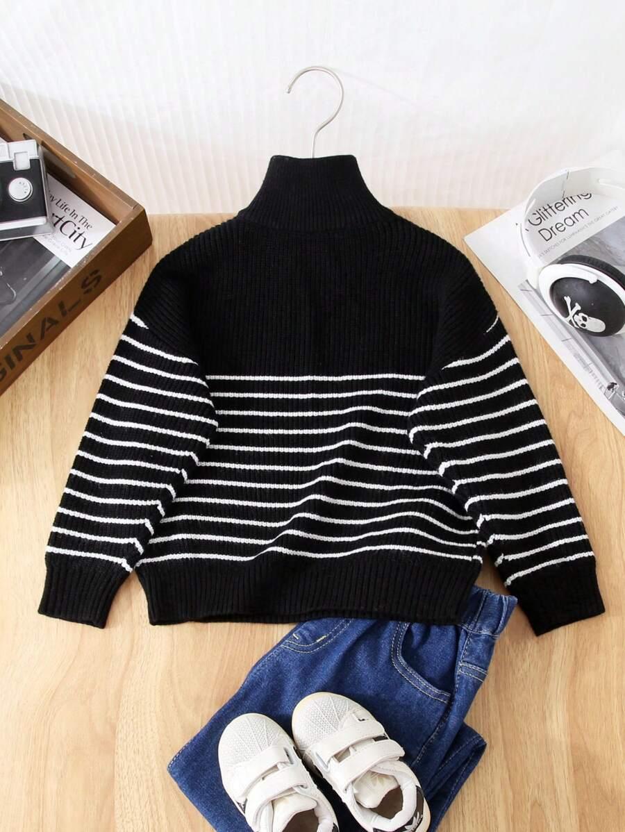 czarny sweter paski