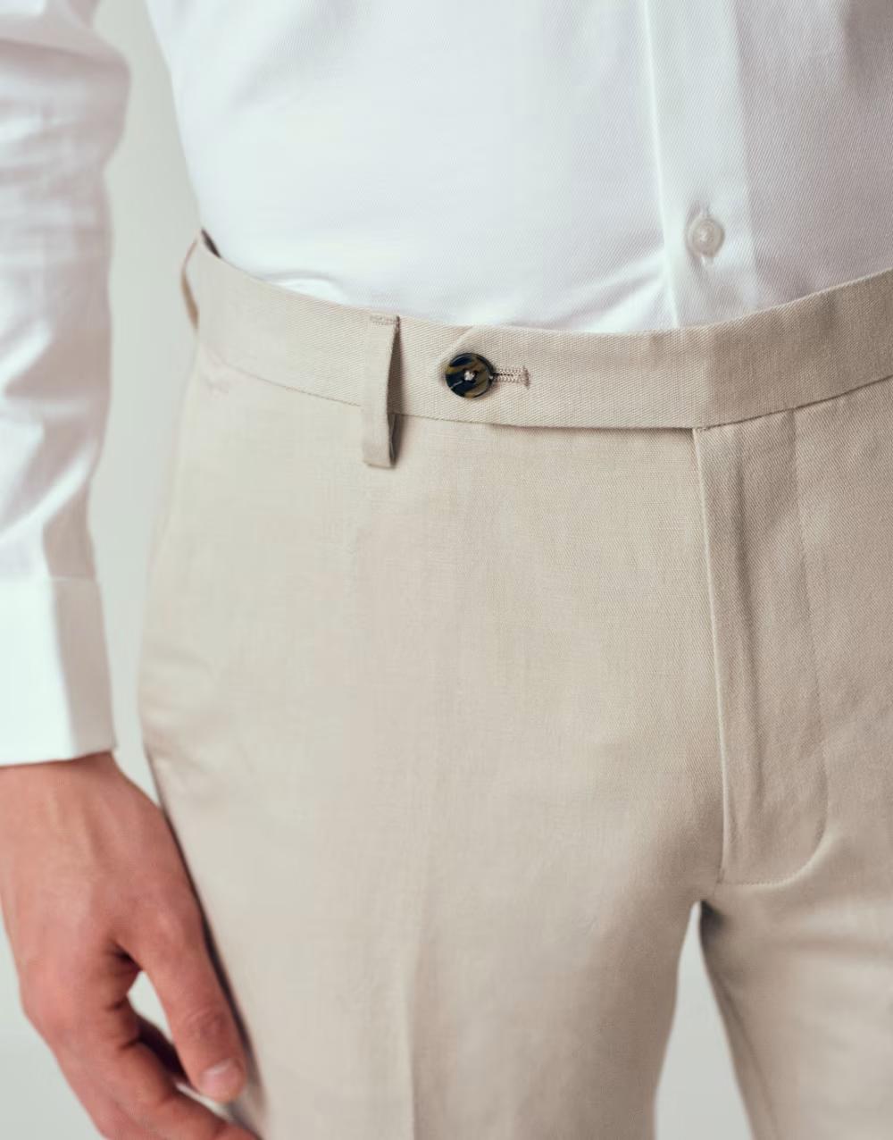 beżowe eleganckie spodnie kieszenie