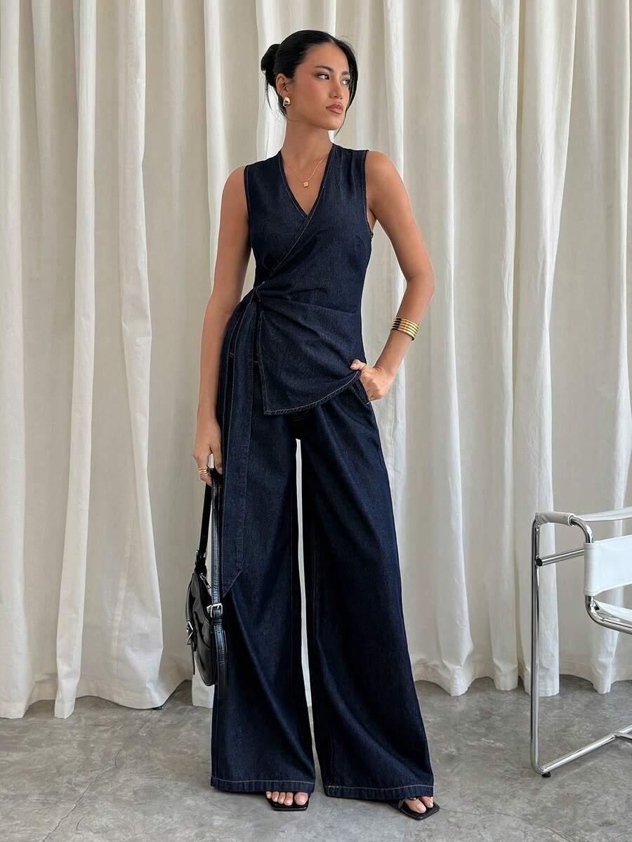 granatowy komplet bluzka spodnie jeans