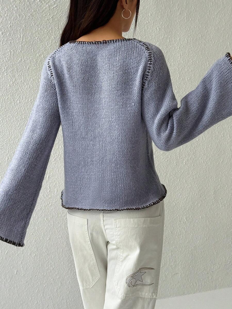 sweter guziki dzianina
