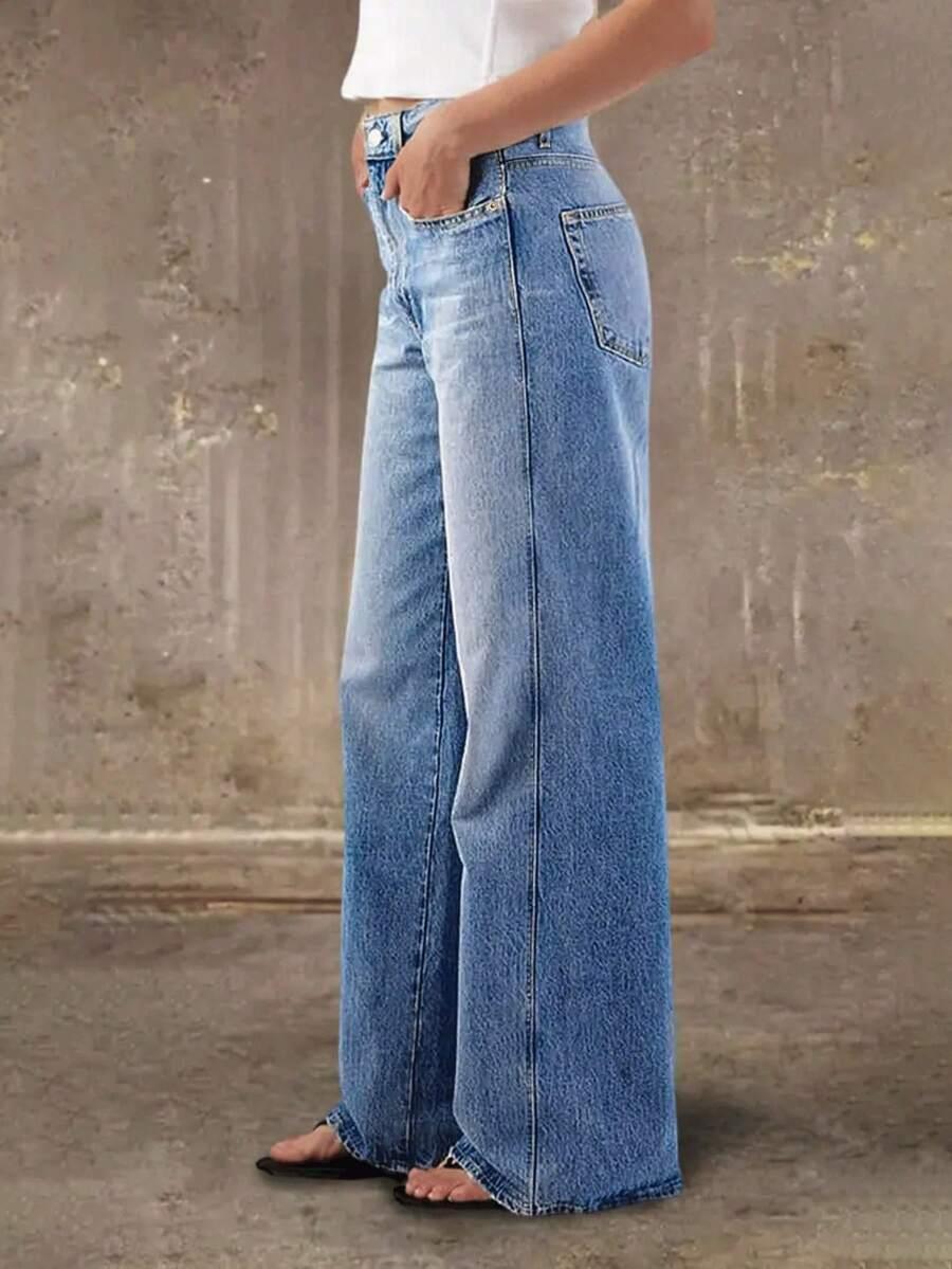 niebieskie spodnie jeans 