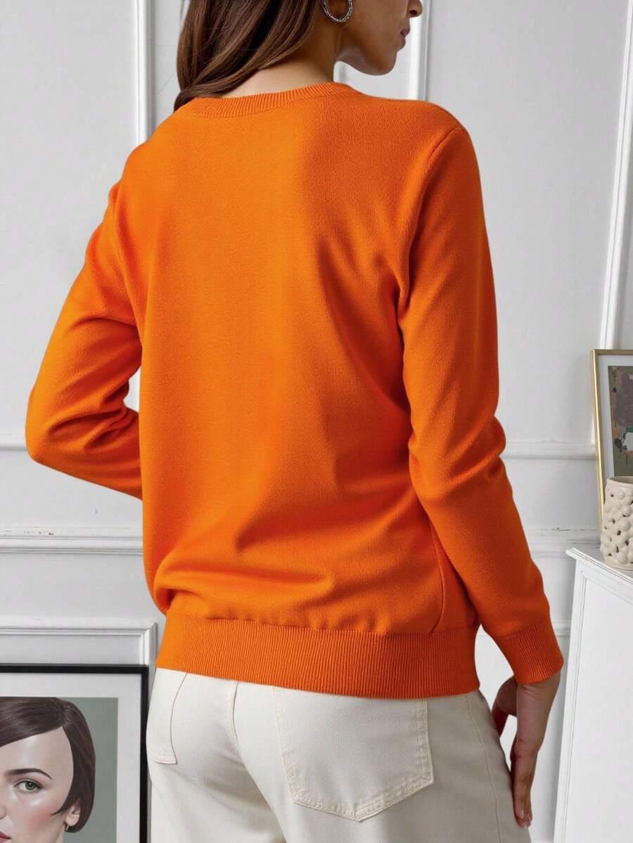 POMARAŃCZOWY sweter guziki 