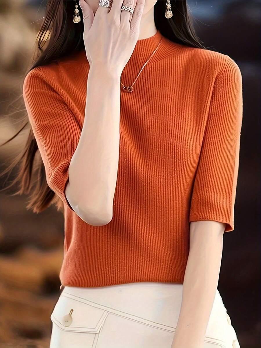 pomarańczowy sweter z krótkim rękawem