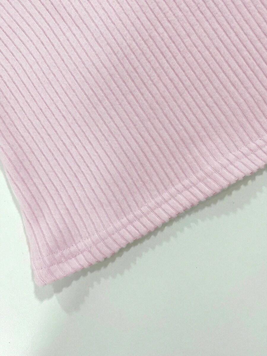 różowy sweter v-neck