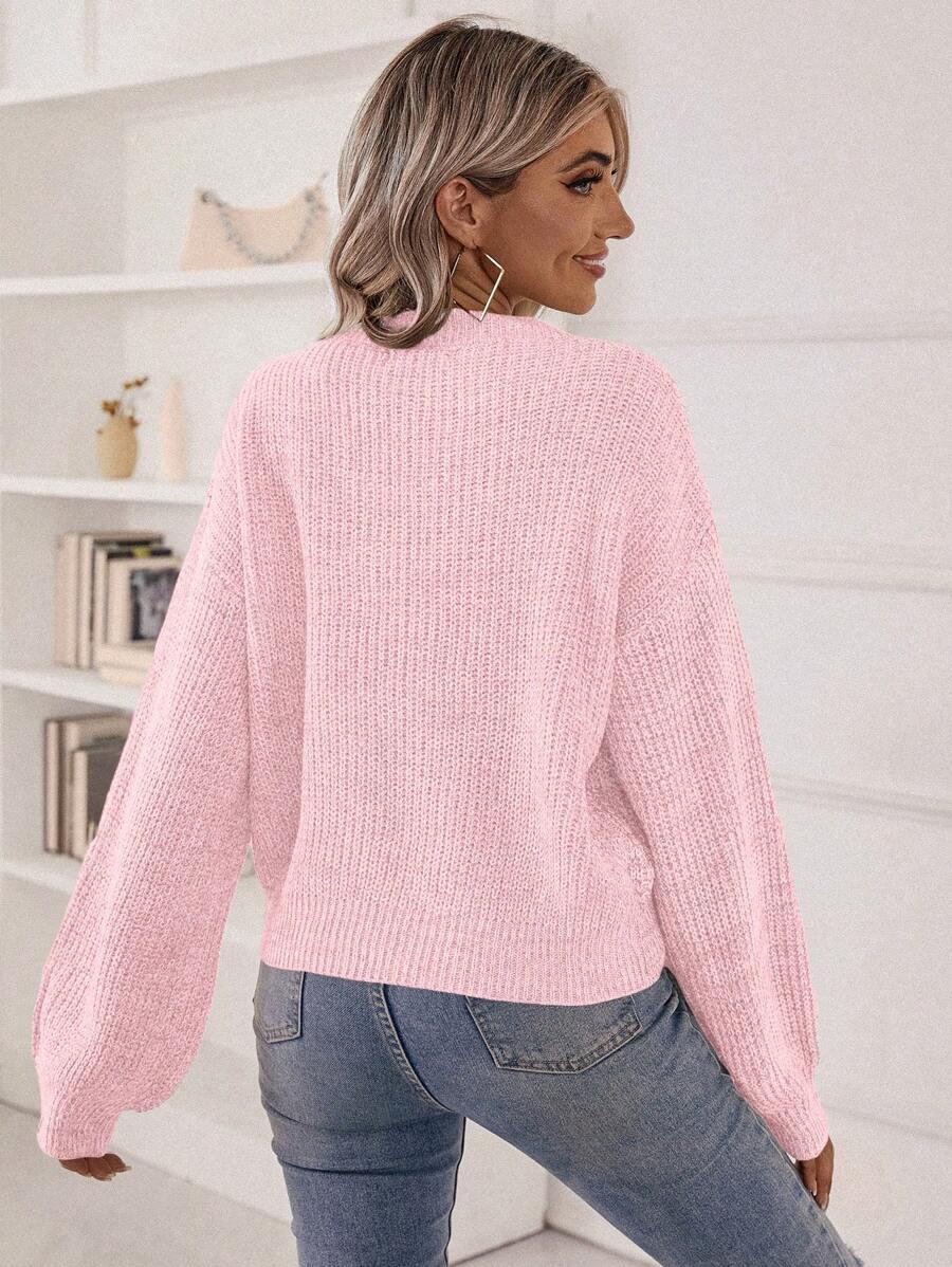 różowy sweter v-neck