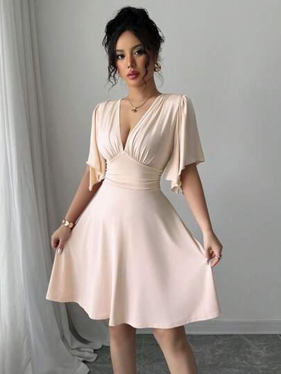 BEŻOWA SUKIENKA V-NECK