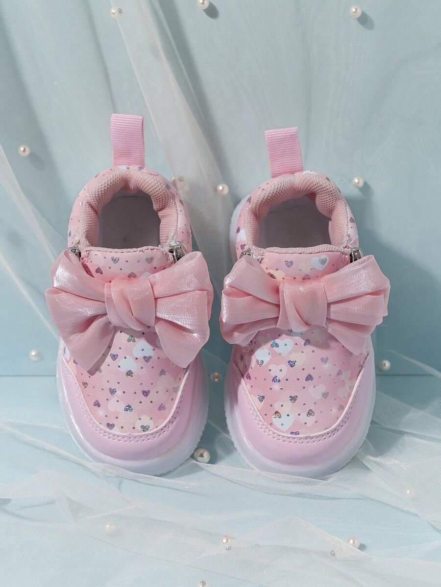różowe święcące buty