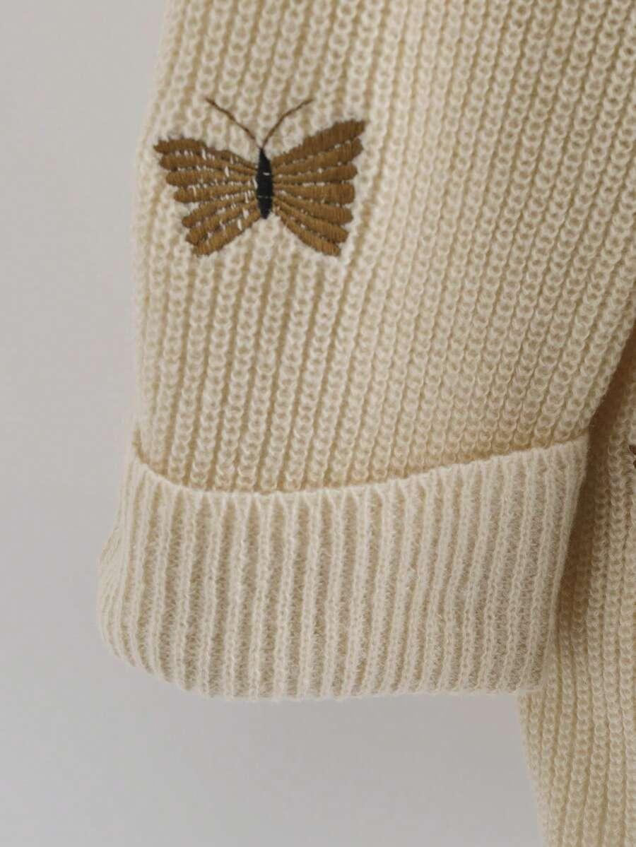 beżowy sweter haft