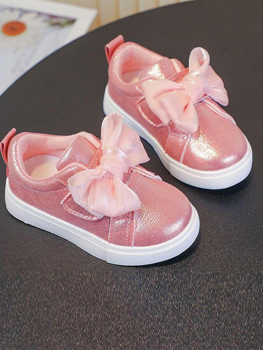 różowe buty sportowe