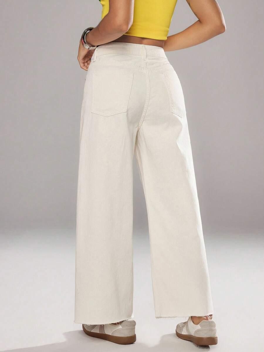 beżowe spodnie jeans