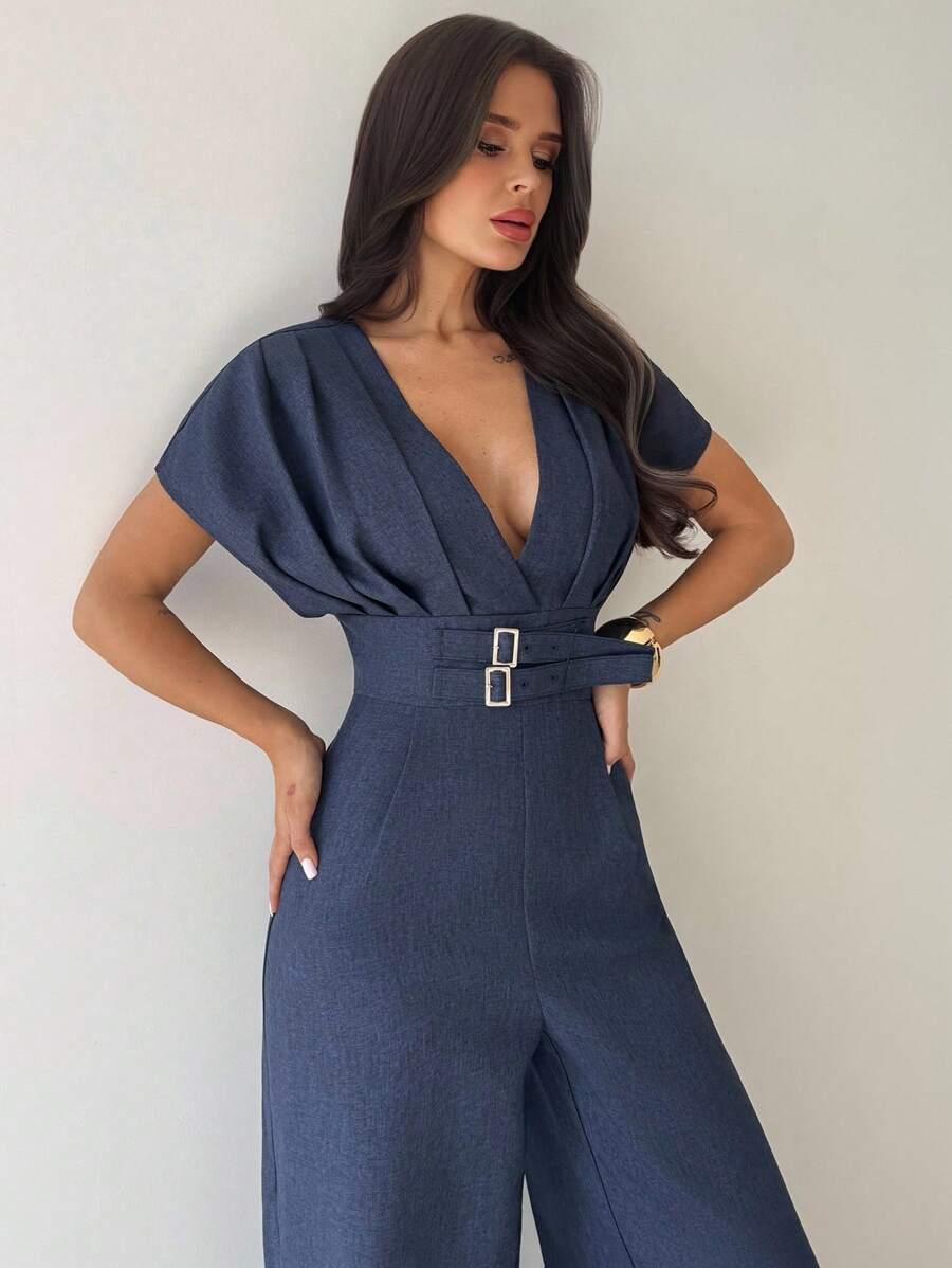 granatowy kombinezon z krótkim rękawem