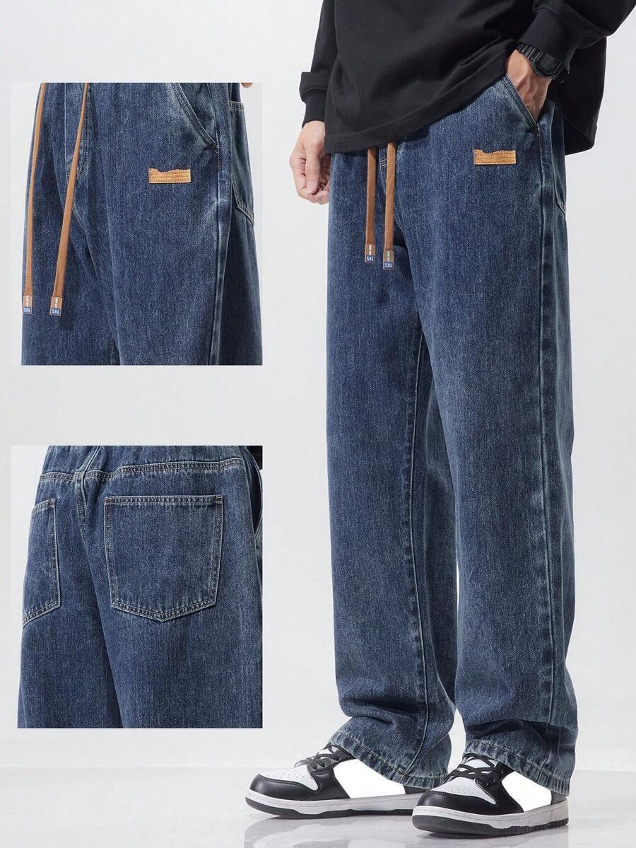 niebieskie spodnie jeans