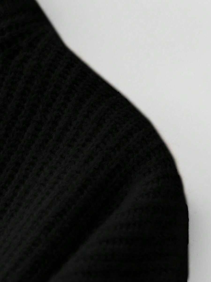 czarny sweter zamek