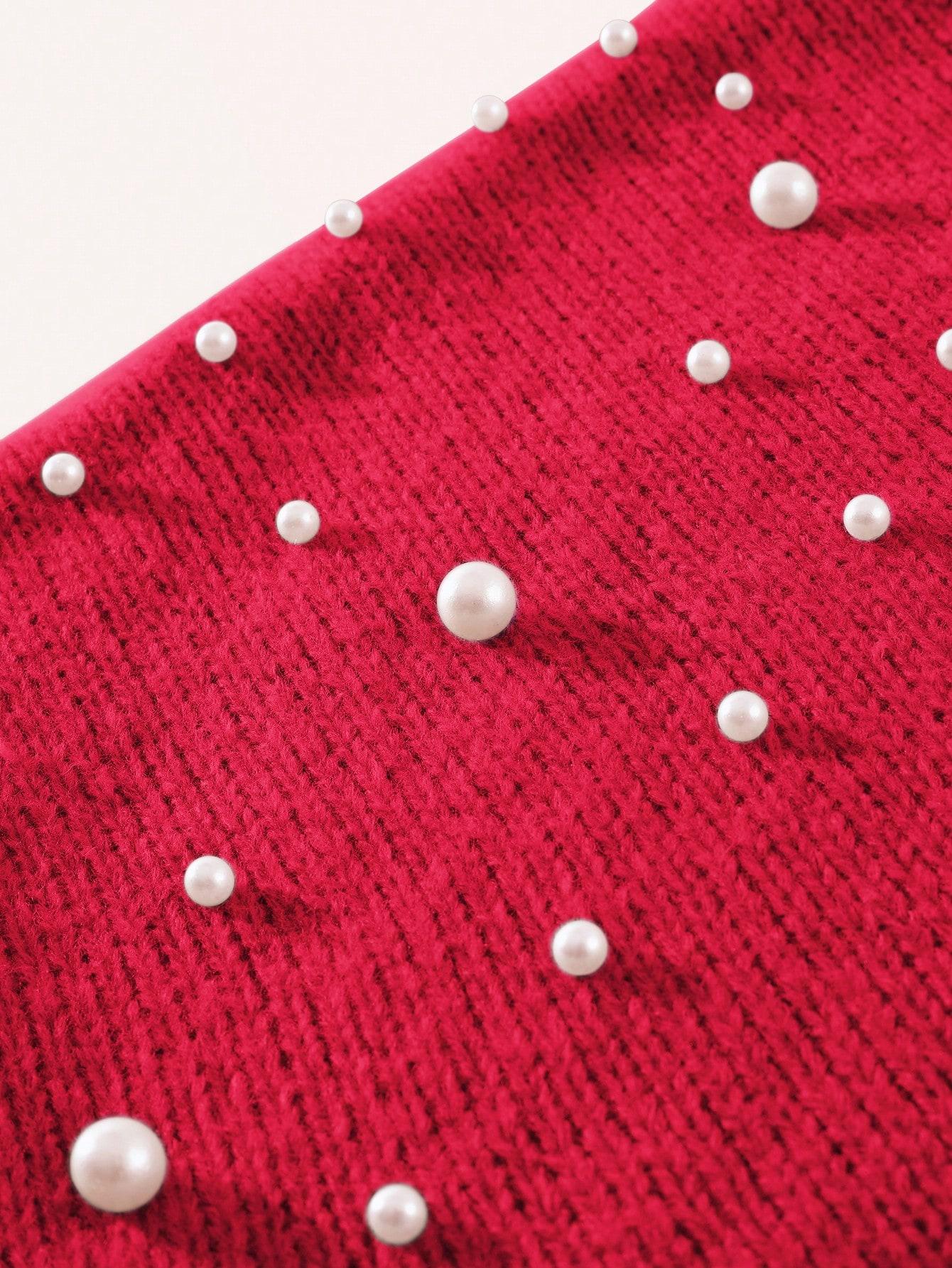 czerwony sweter zdobienie
