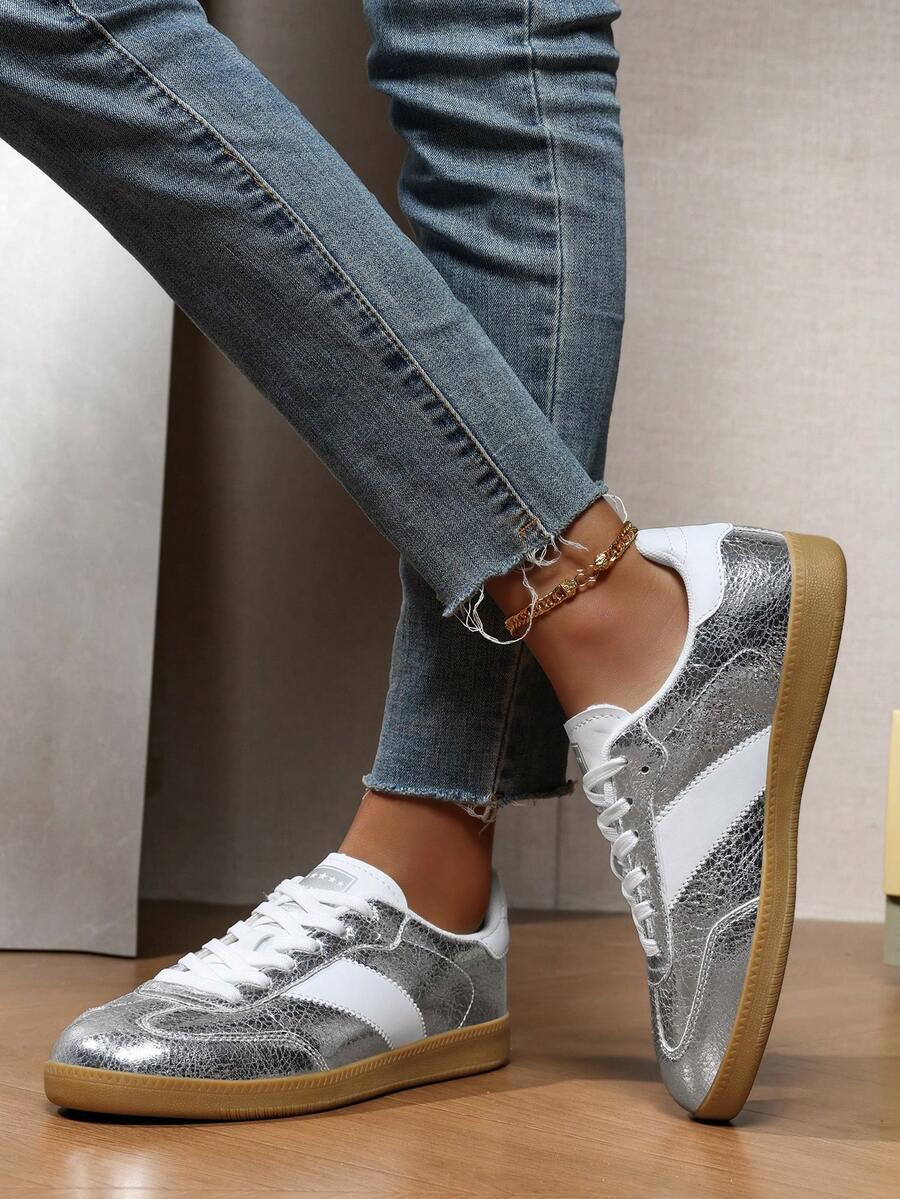 srebrne sznurowane buty sportowe 