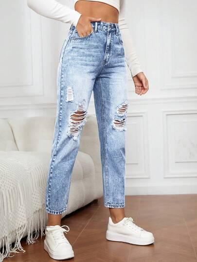 niebieskie spodnie jeans przetarcia