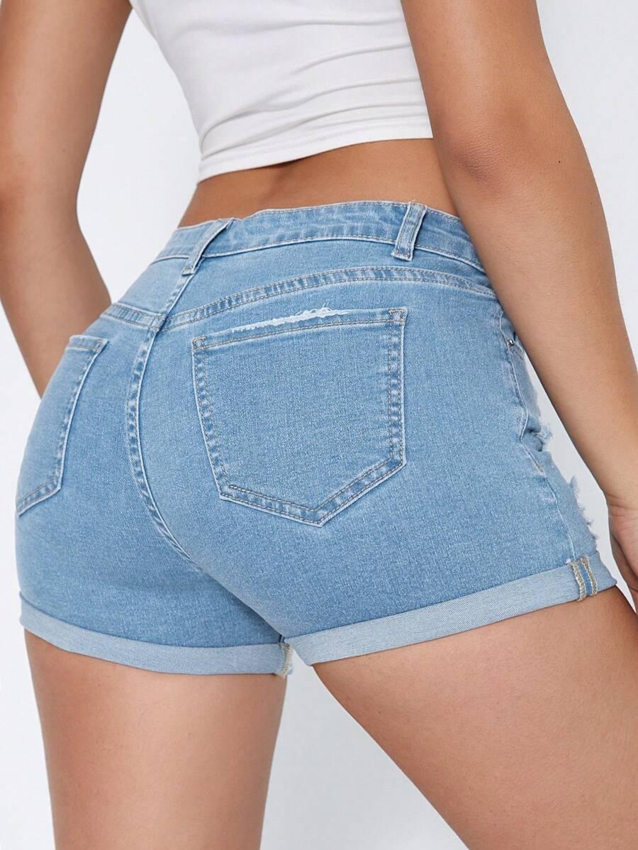 niebieskie spodenki jeans przetarcia