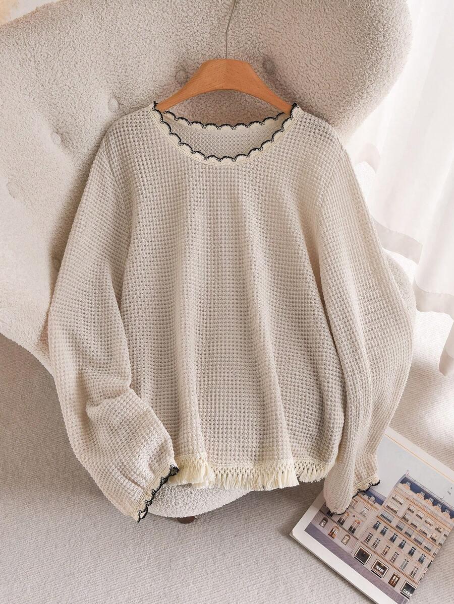 beżowy dzianinowy sweter