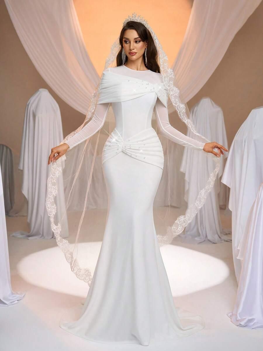 suknia ślubna zdobienia perełki marszczenia