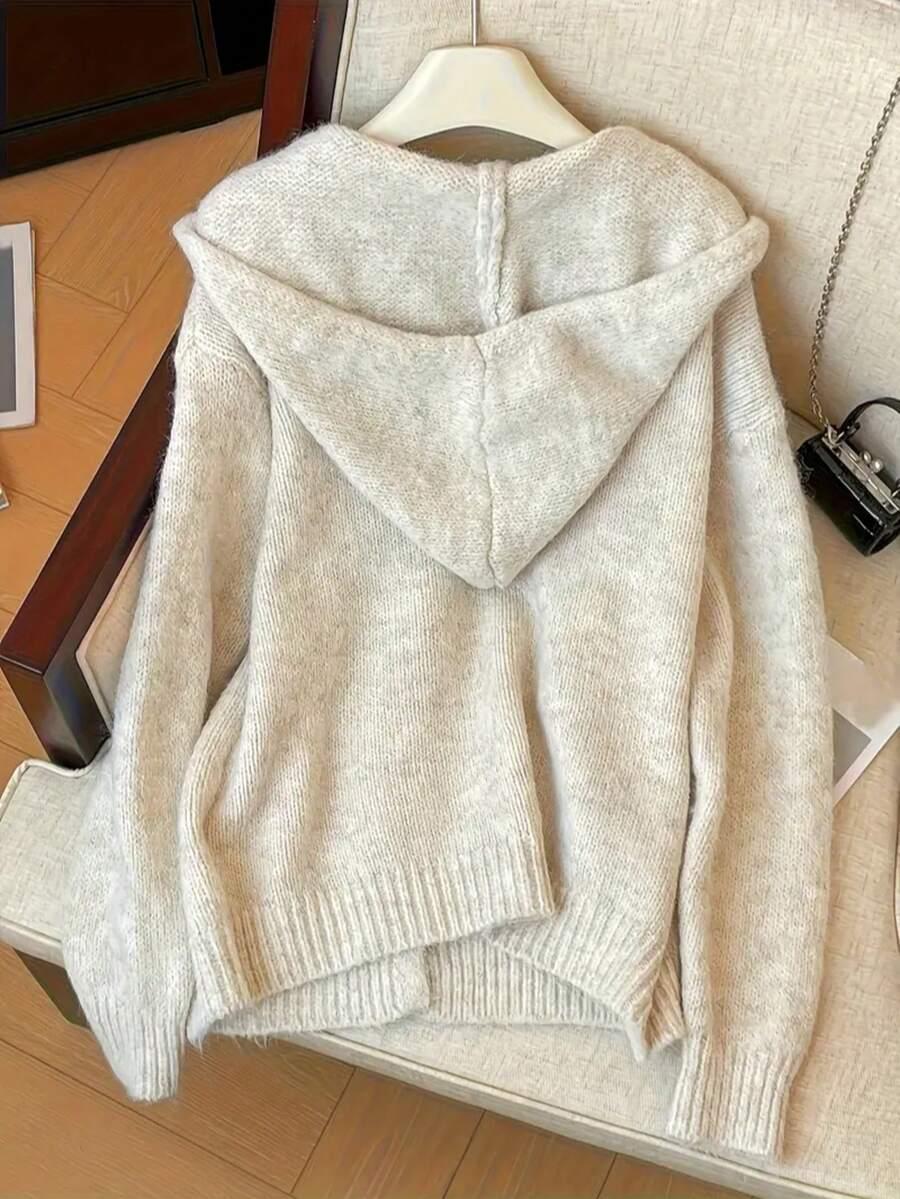 beżowy sweter kaptur