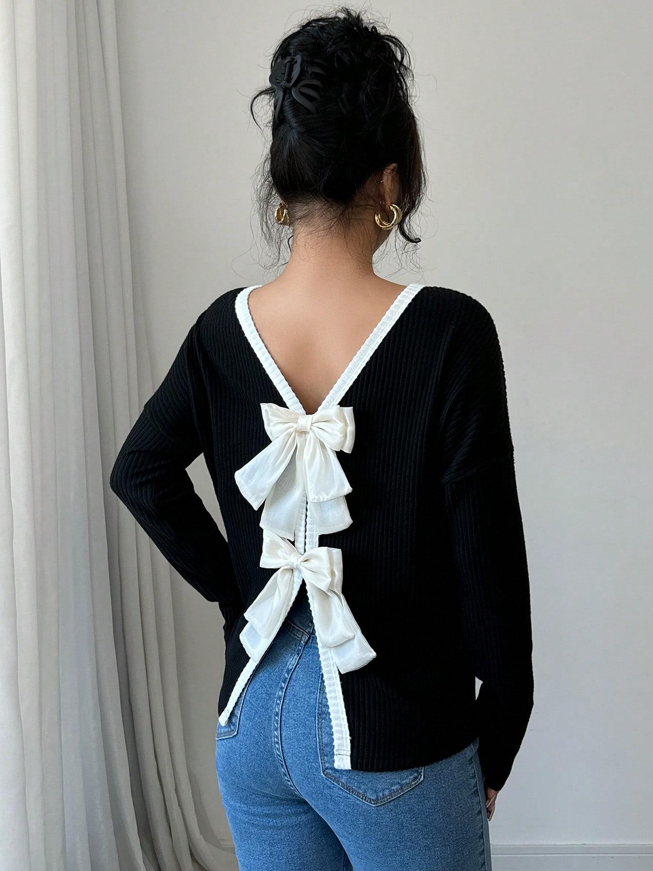 CZARNY SWETER KOKARDY 
