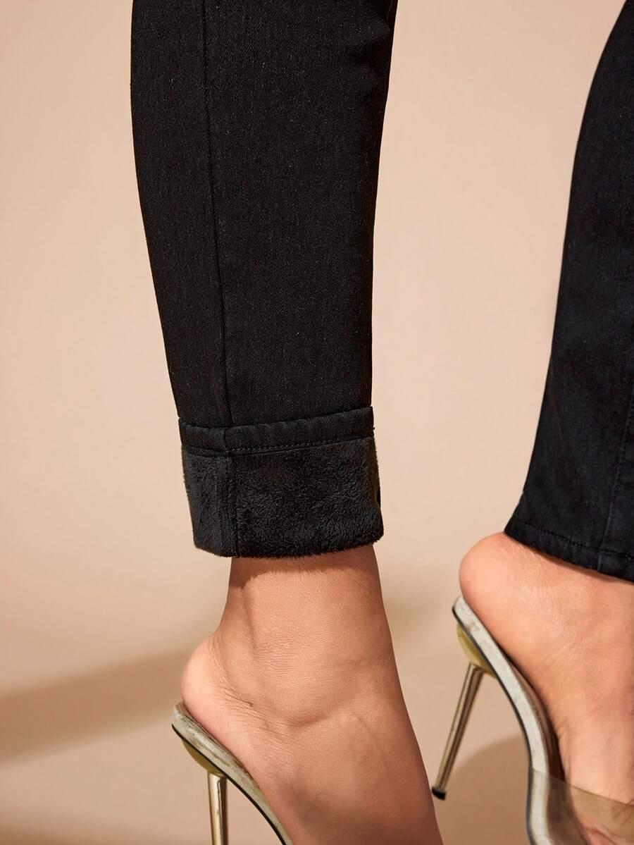 CZARNE OCIEPLANE SPODNIE JEANS