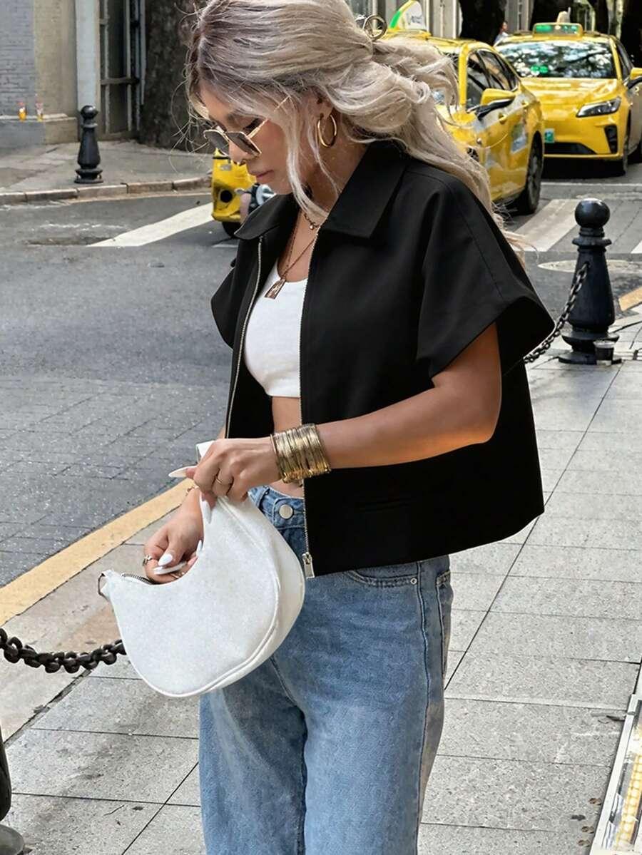 CZARNA BLUZKA ZAMEK