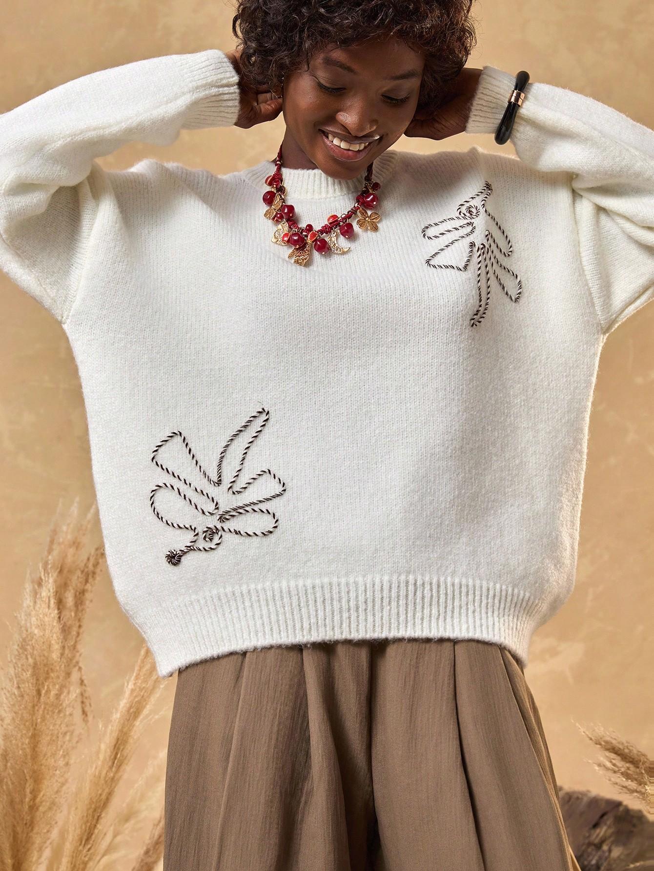 SWETER Z HAFTEM