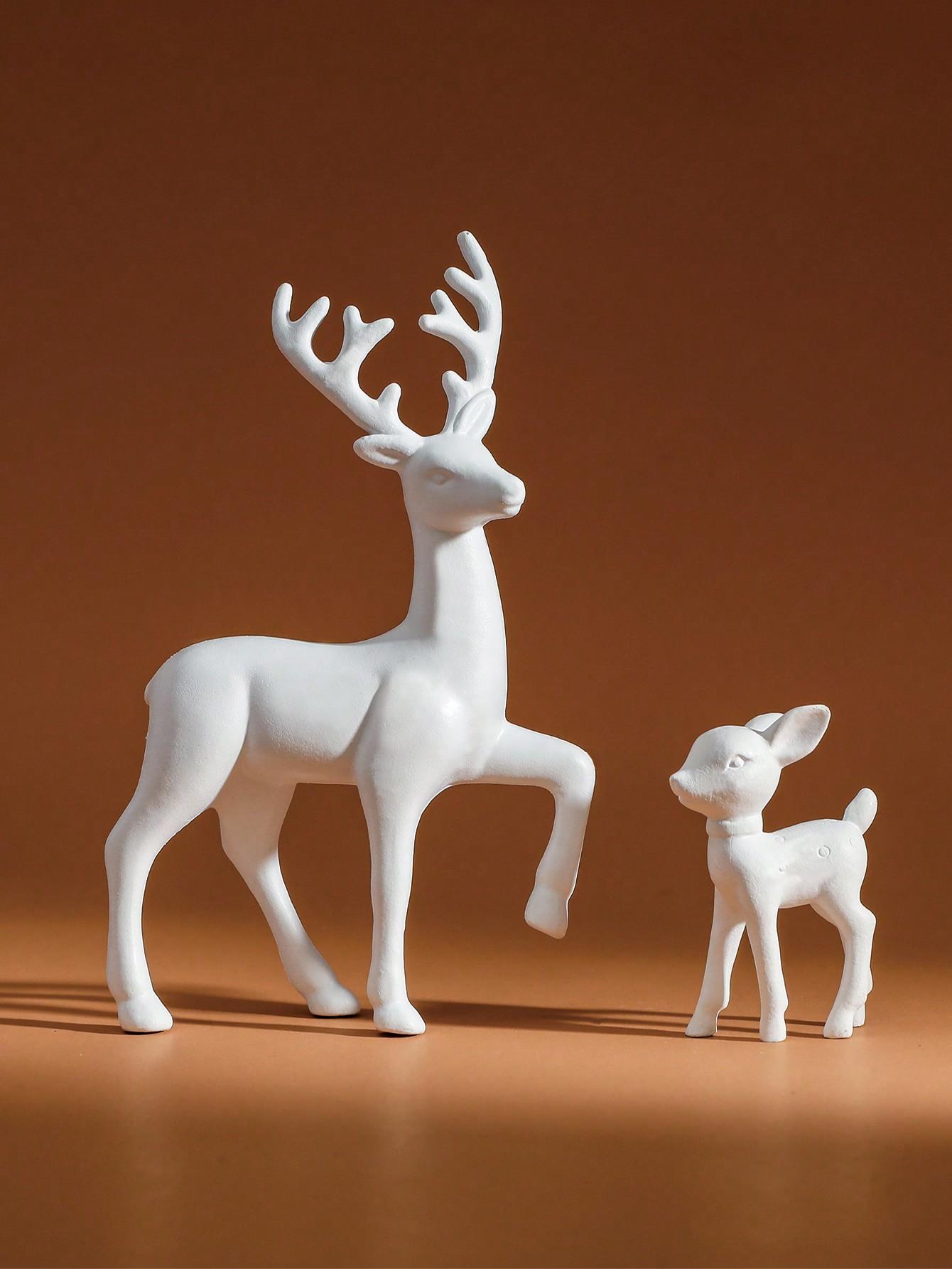 biała figurka renifer 1-pack