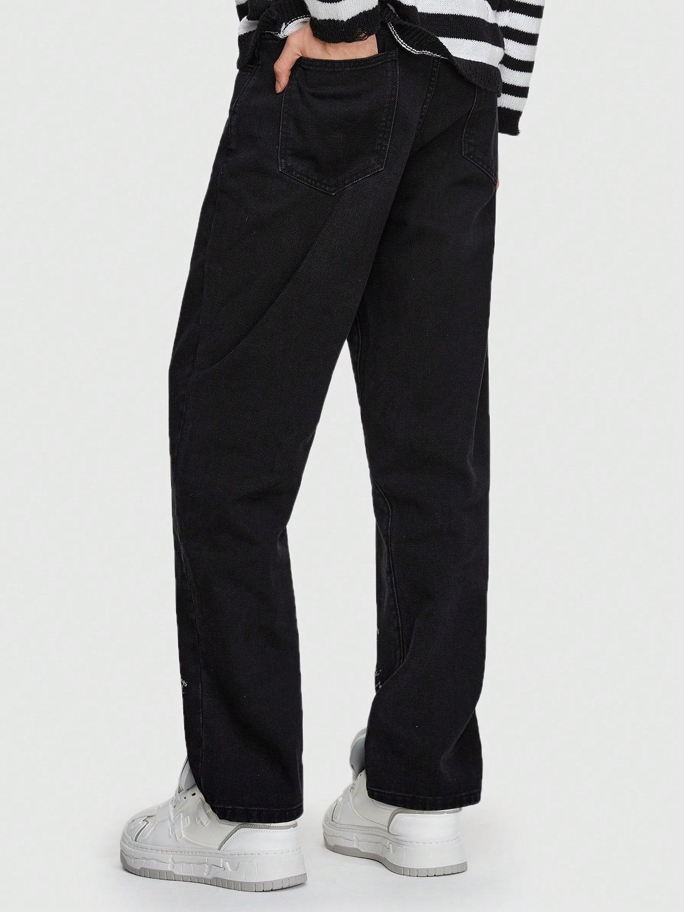 czarne spodnie jeans nadruk