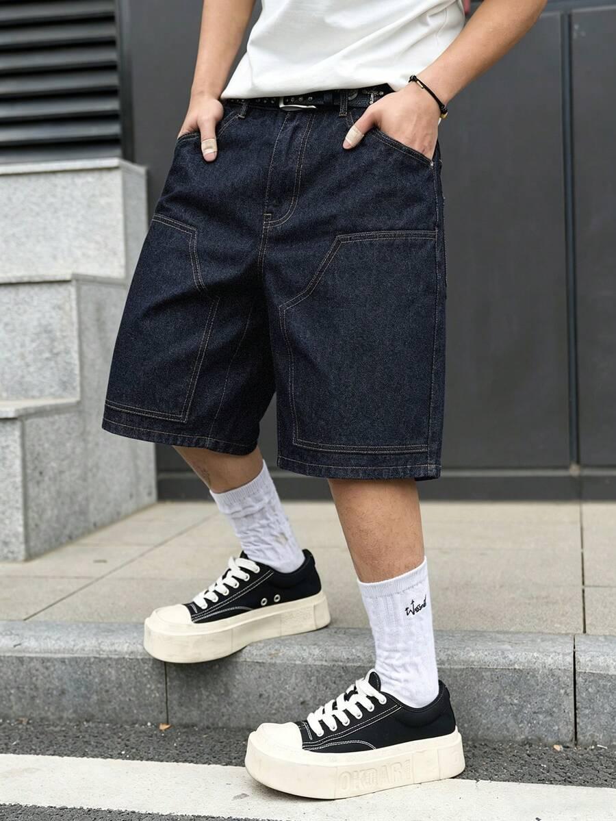 niebieskie spodenki jeans
