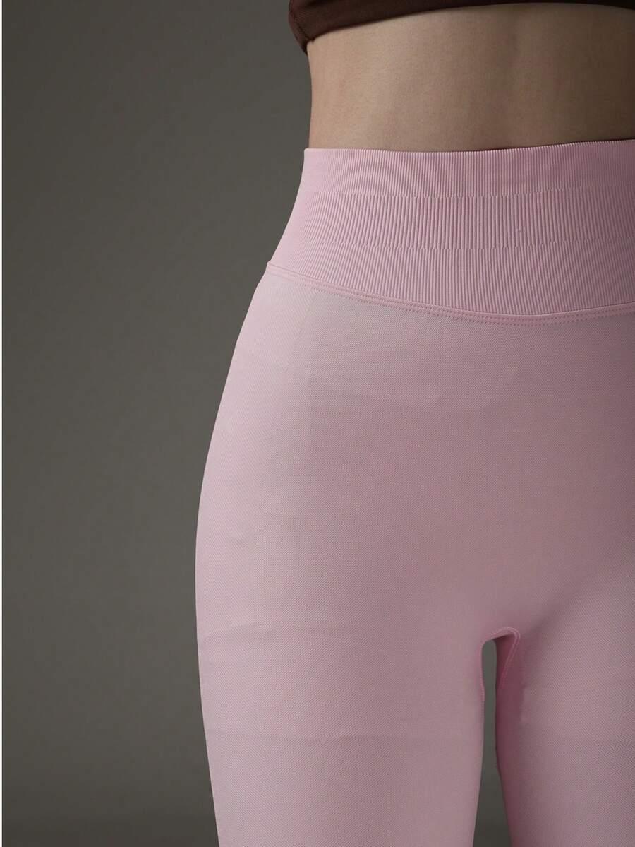 różowe legginsy sportowe