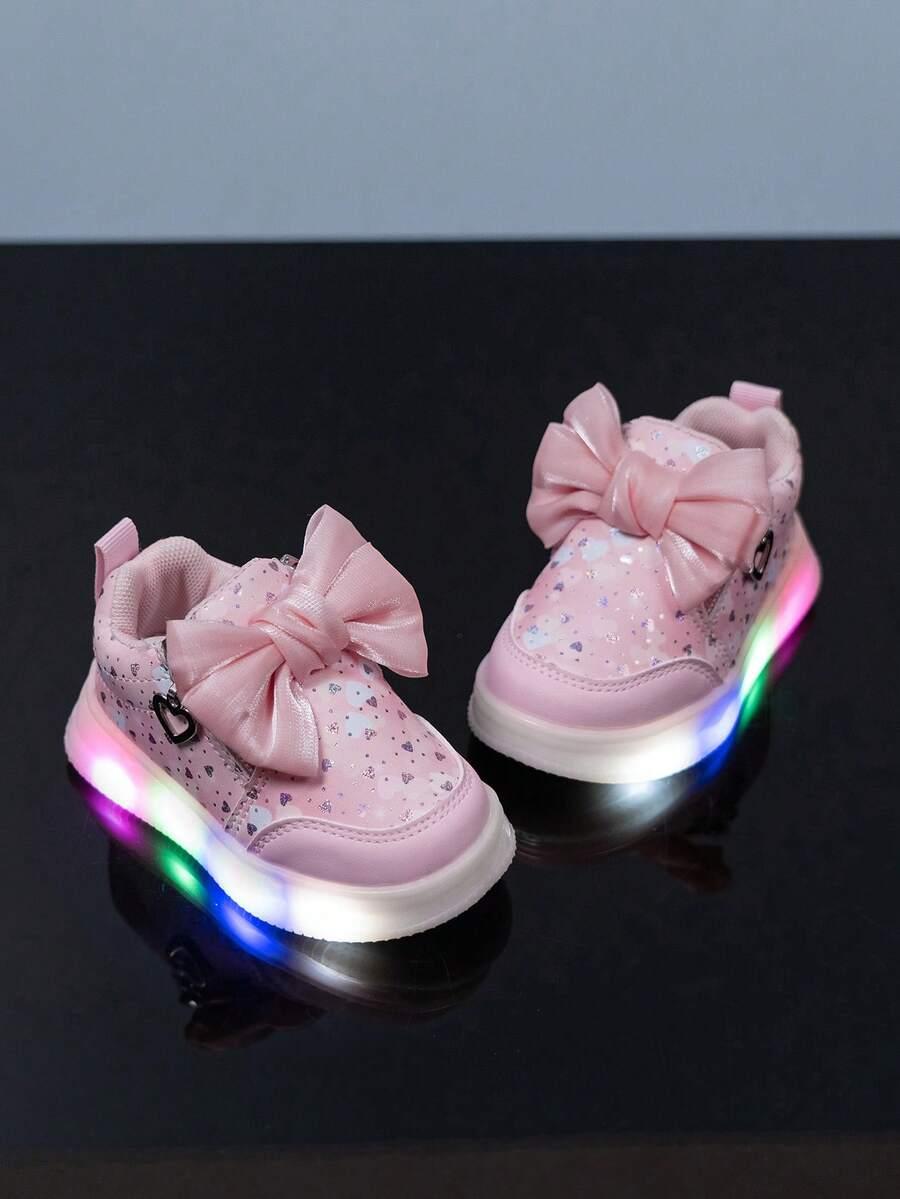 różowe święcące buty