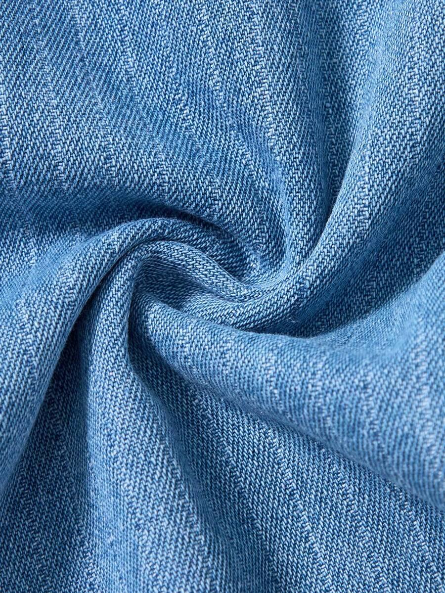 niebieski kombinezon jeans