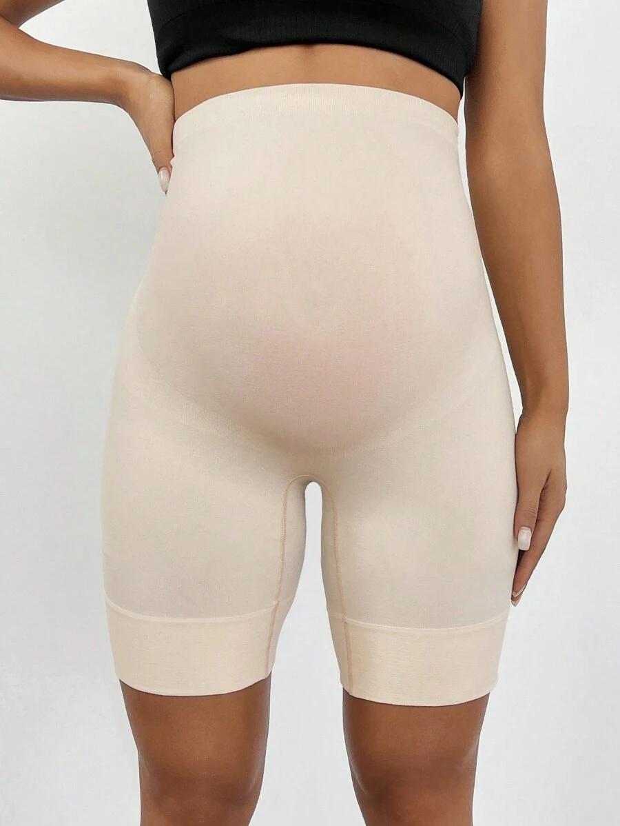 beżowe krótkie legginsy