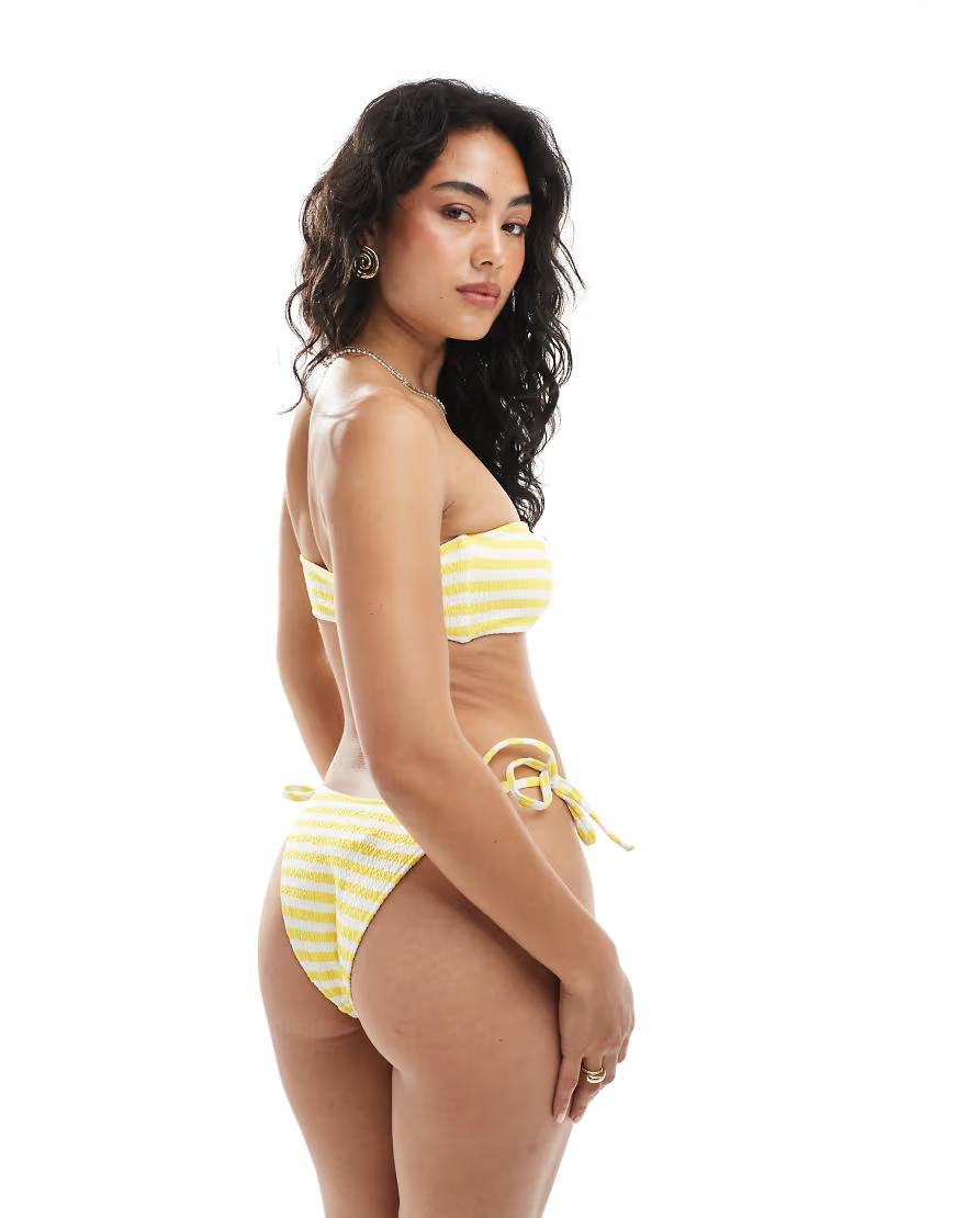 żółta góra od bikini w paski