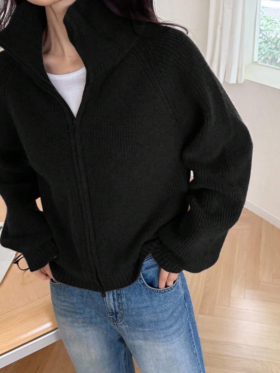 czarny sweter zamek
