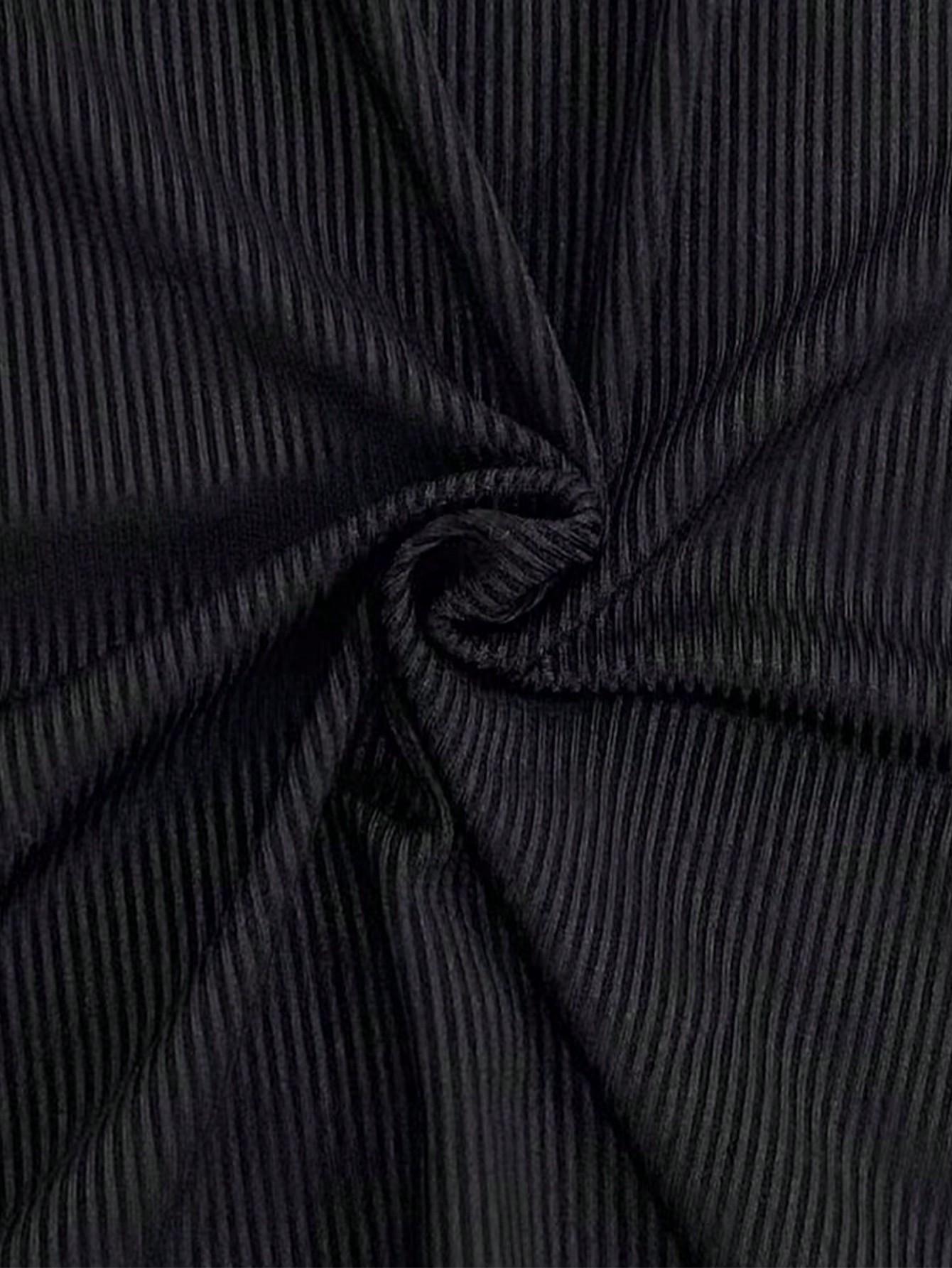 prążkowane czarne legginsy dzwony